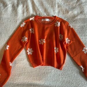 Orange flower crop sweater